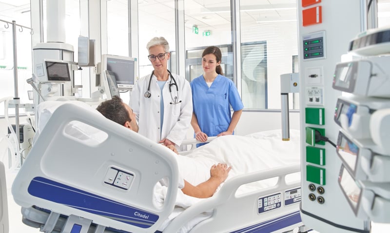 nurse and doctor with patient ICU nurse and doctor with patient ICU (1)