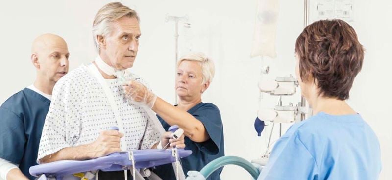 Arjo Early Mobilisation Sara Plus - Caregivers taking care of patient - 2135x600