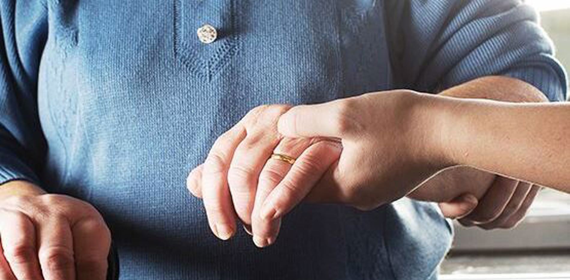 Arjo nurse elderly hands 555x555
