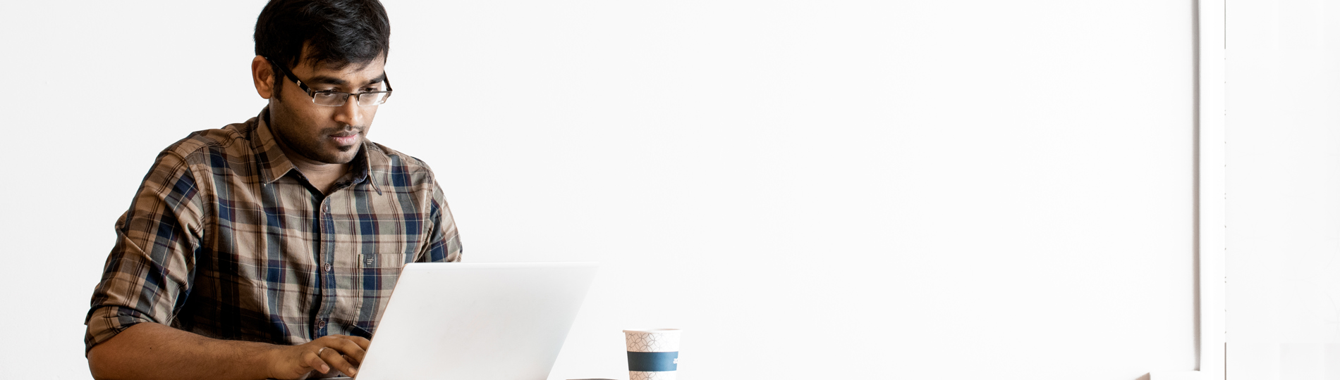 Kumaran working Arjo logo