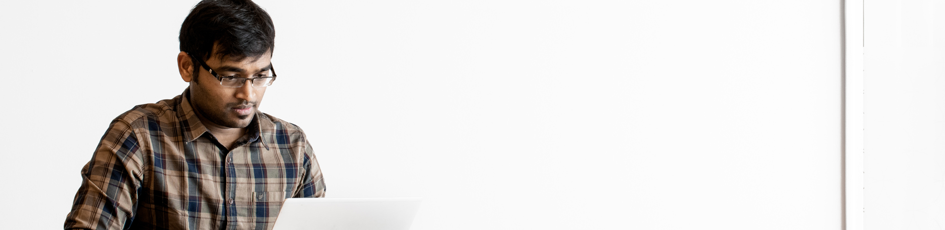 Kumaran working Arjo logo