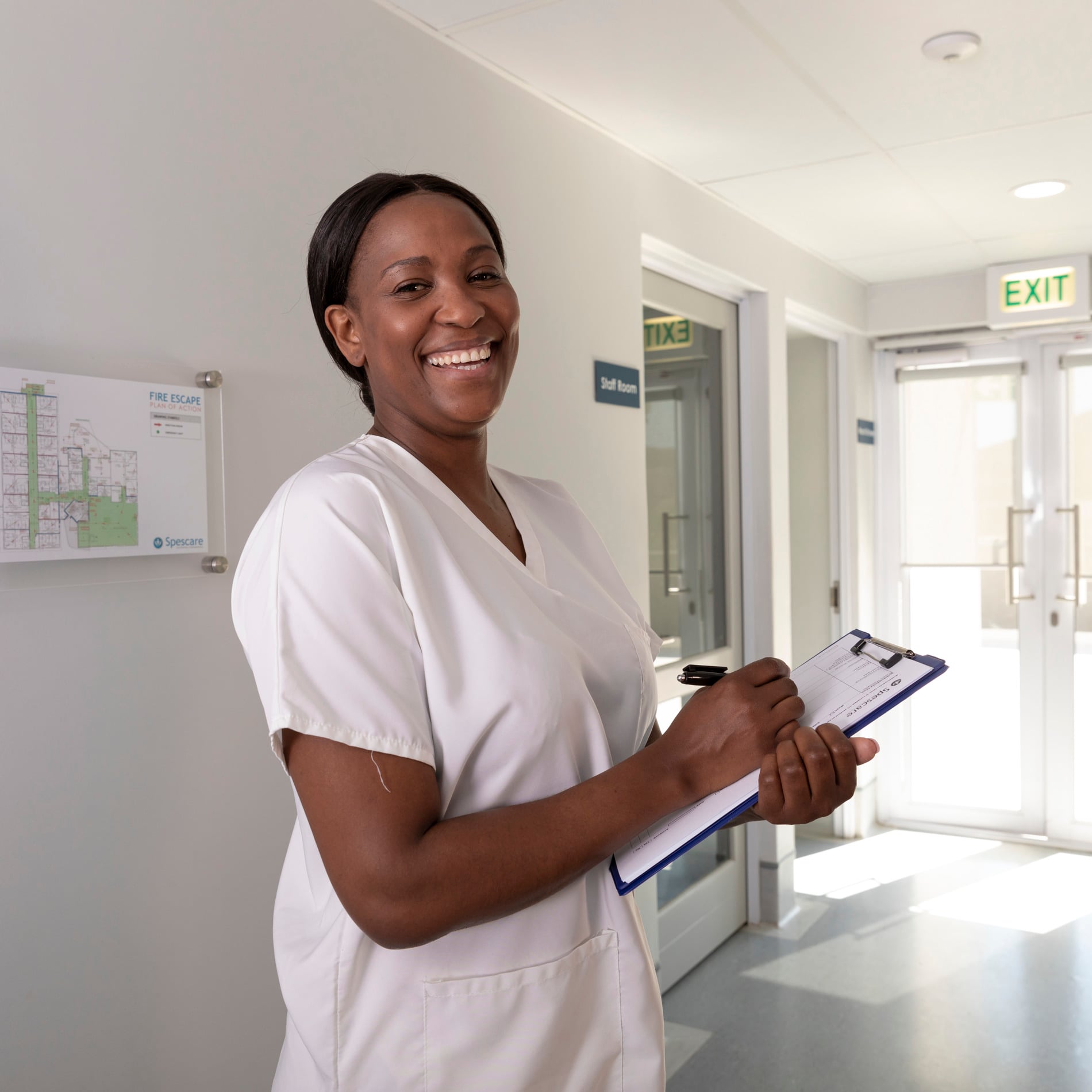 smiling nurse in corridor (2)