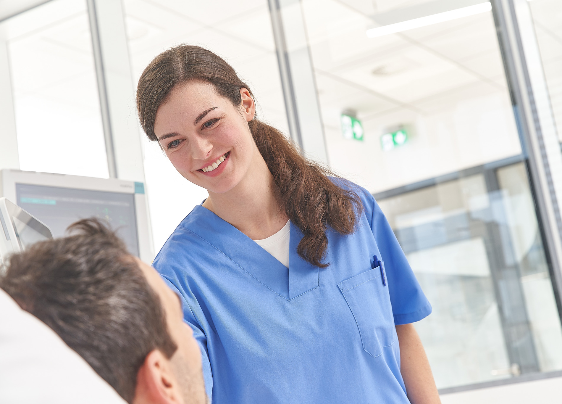 nurse with patient in ICU (2)