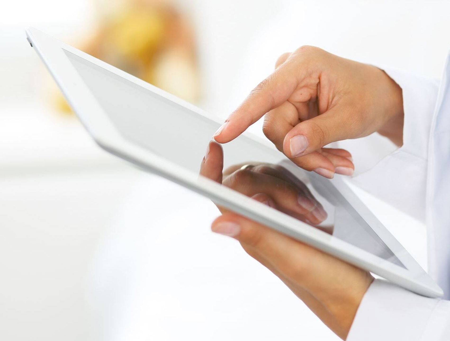 Doctor with tablet