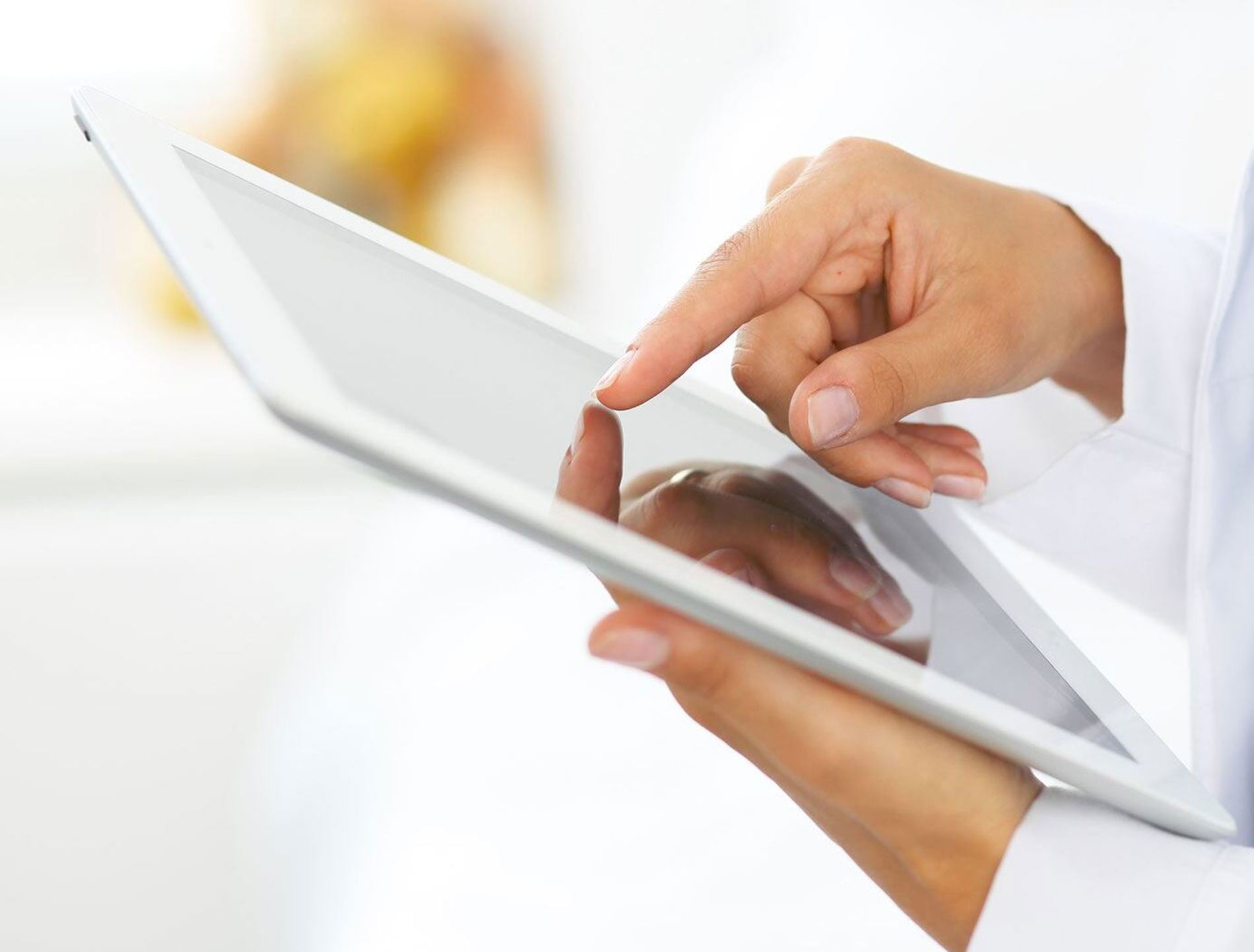 Doctor with tablet