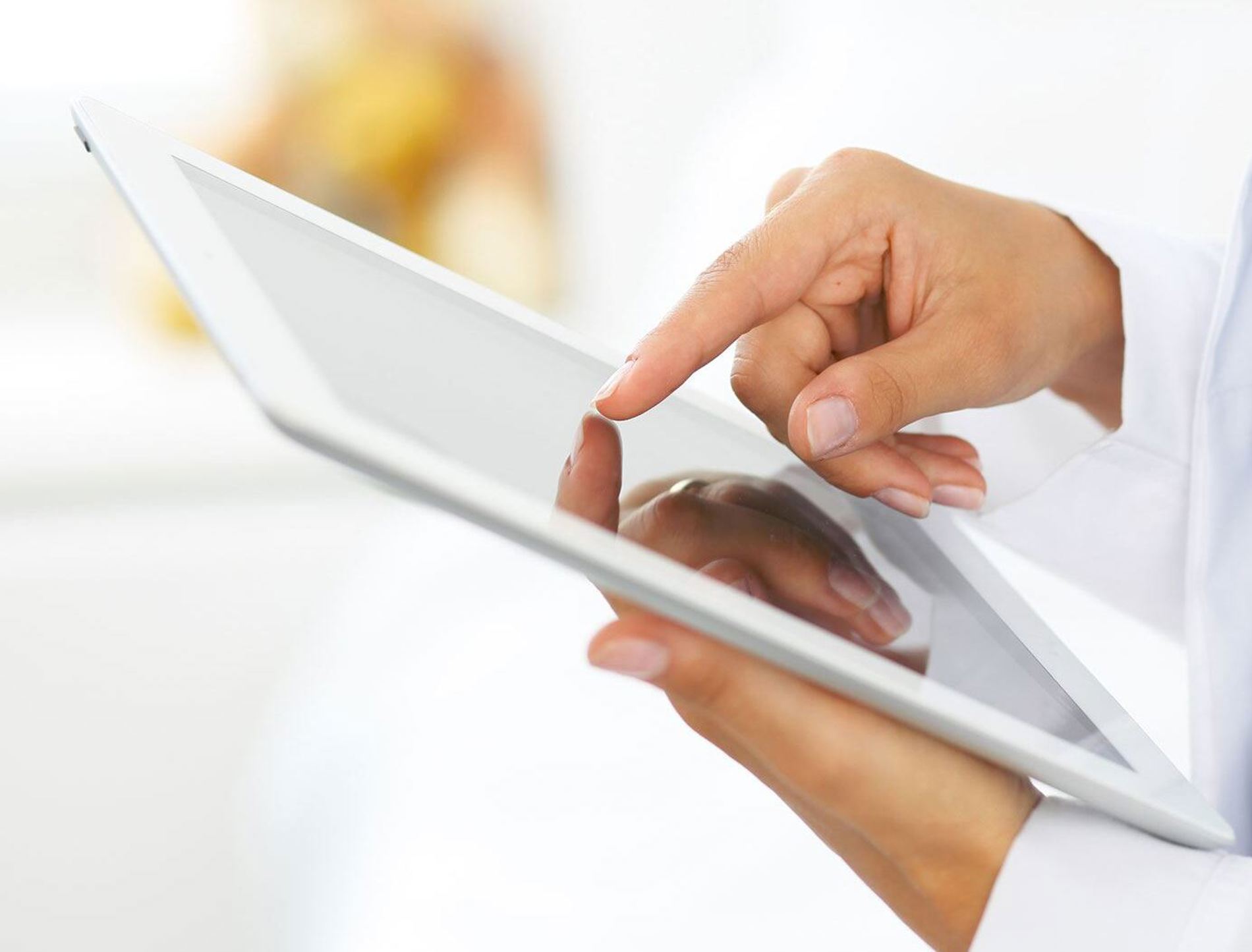 Doctor with tablet
