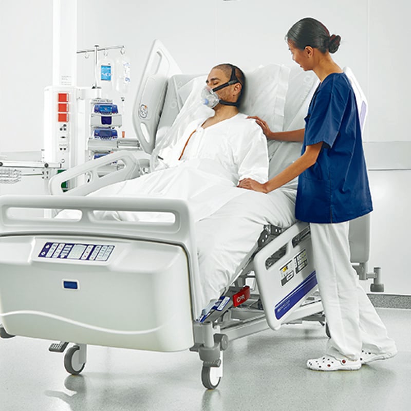 Arjo Early mobilisation Citadel ICU nurse and patient in bed 500 x 500.jpg