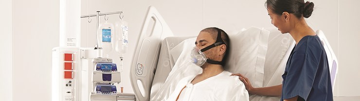 Arjo early mobilisation Citadel ICU Patient in Bed 2135 x 600.jpg