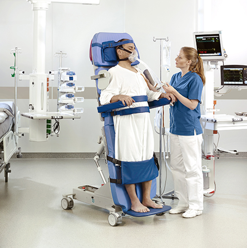 Arjo Early mobilisation Combilzer  nurses and patient 500 x 500 new.jpg