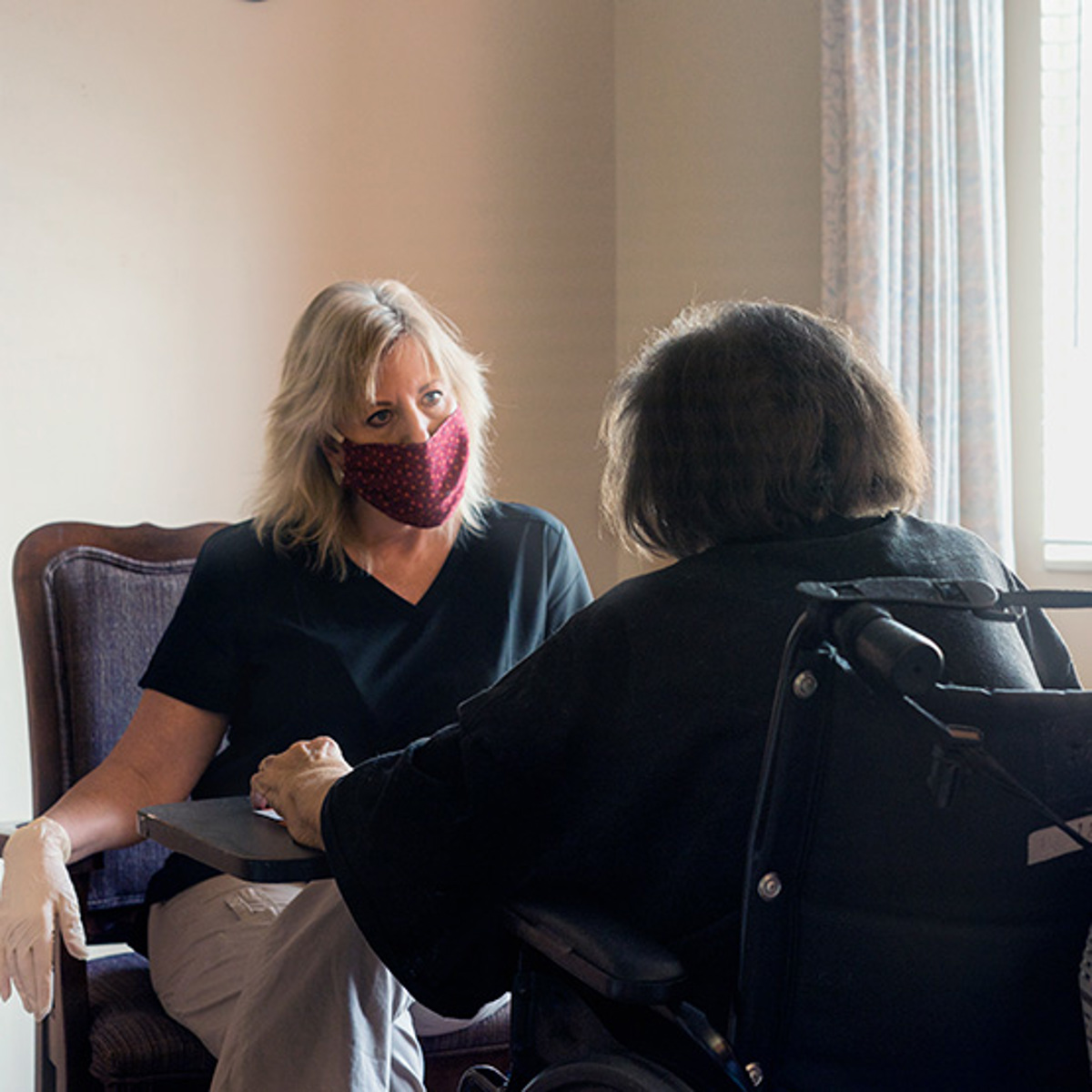 Dementia-Care---Nurse-with-patient-in-wheelchair.jpg