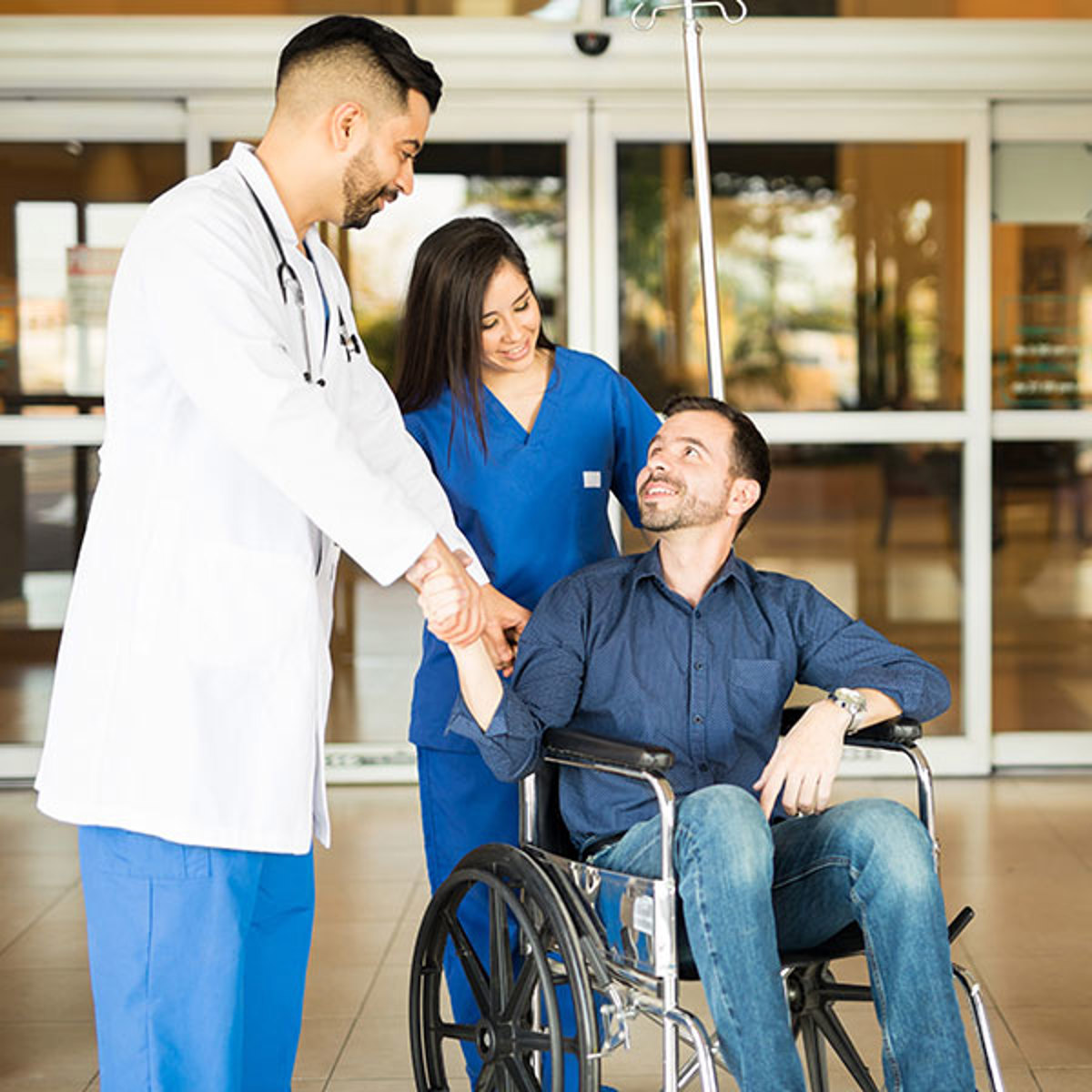 doctor helping patient outside